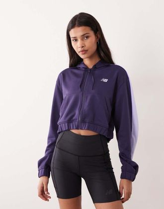 New Balance Top viola in tessuto interlock con zip