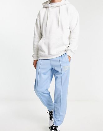 Nike Joggers affusolati color blu leche