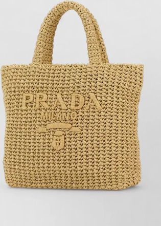 Prada raffia shoulder bag featuring woven texture