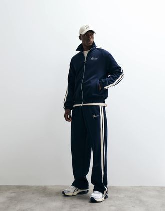 Cernucci Pantaloni sportivi comodi blu navy con fettucce laterali in coordinato