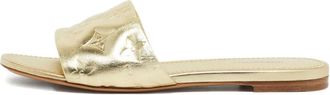 Louis Vuitton Sandali in pelle goffrata con monogramma - Oro