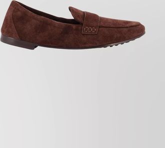 Tory Burch suede loafers featuring metal logo design
