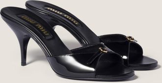Miu Miu Patent leather mules with buckle