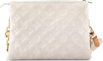 Louis Vuitton Coussin Bag Monogram Embossed Lambskin PM crossbody bag - Bianco