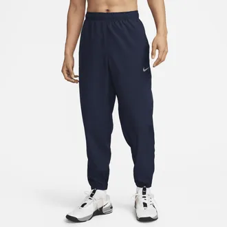 Nike Mens Form Dri-FIT Tapered Versatile Pants in Blue | FB7497-451