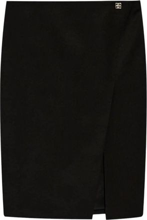 Givenchy Zwarte Rok met Metalen Logo Opening - Dames - Midirokken - Zwart - M - Wol - Rokken