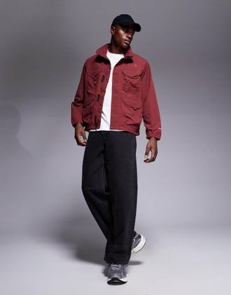 The North Face Giacca multitasche rossa convertibile-Rosso