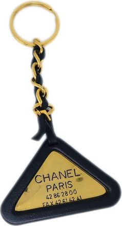 Chanel 1994 triangle-logo key holder - women - Gold Plated/Leather - One Size - Black