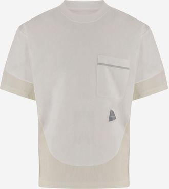 And Wander Camiseta de algod&oacute;n con estampado de And Wander