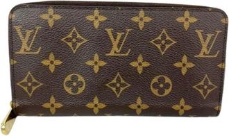 Louis Vuitton Pre-owned Zippy Monogram Leather Fuchsia Wallet Clutch - Dames - Vintage Accessoires - Bruin - ONE Size - Leer - Vintage