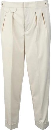 Bonheur Tailored White Trousers With Front Pleats And Cuffed Hem