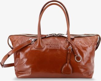 Miu Miu Borsa a mano in pelle lucida con logo lettering frontale - MIU MIU - gender_Woman