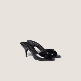 Miu Miu Patent leather mules with buckle