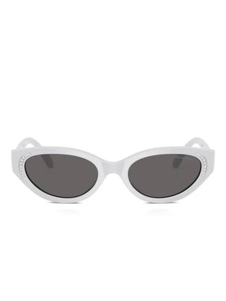 Swarovski Occhiali da sole cat-eye con decorazione - Grigio