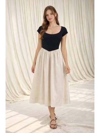 Moon River Basque Waist Short Sleeve Mixed Media Dress In Black/cream
