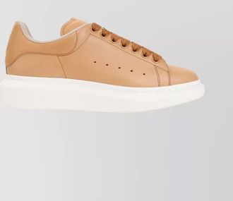 Alexander McQueen leather sneakers with round toe and side perforations
