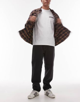 Carhartt Work in Progress Newel - Jeans affusolati vestibilità comoda color nero slavato