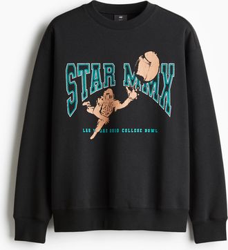 H&M Bedrucktes Sweatshirt in Loose Fit - Schwarz