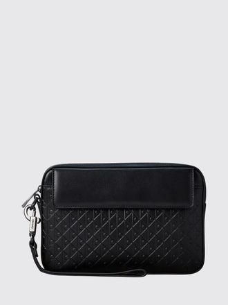 Calvin Klein Monogram Faux Leather Pouch with an embossed logo and wrist strap