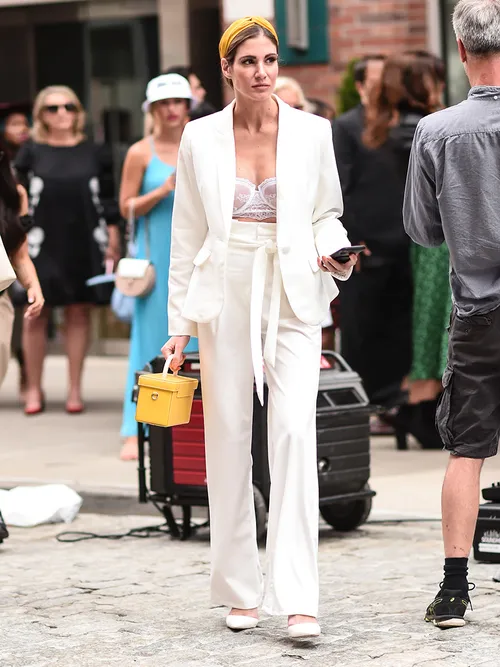 non-traditional bride, non-traditional wedding dresses, wedding dresses, lesbian wedding dresses, androgynous wedding dresses, blue wedding dresses, cape wedding dresses, pantsuit wedding dress, pants wedding dress, alternative wedding dress styles, alternative wedding dress looks