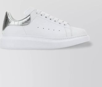 Alexander McQueen leather sneakers with metallic heel detail