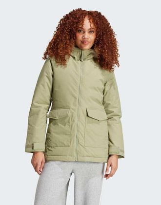 adidas Paveric - Parka verde con pelliccia