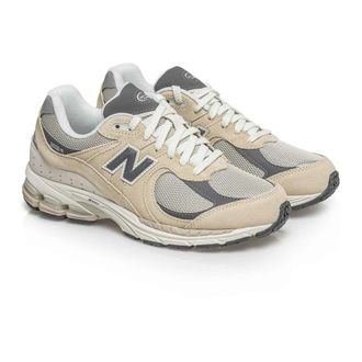 New Balance Beige Leren Unisex Sneakers - Dames - Schoenen - Beige - Maat: 36 EU Leer