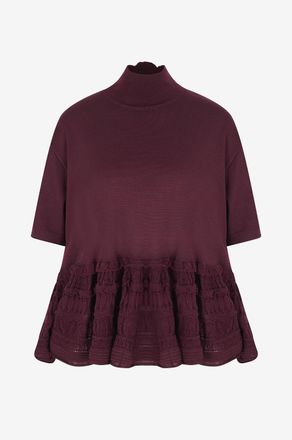 Alaia Top mit Stehkragen aus Schurwolle Peplum