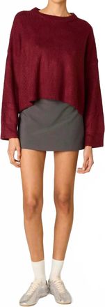 Nia Ariana Wide Ribbed Knit Sweater In Pinot