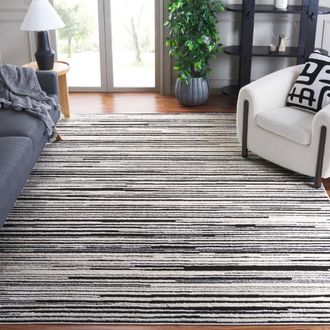 Safavieh Alfombra moderno de poli&eacute;ster blanco/negro, 235 x 305 cm
