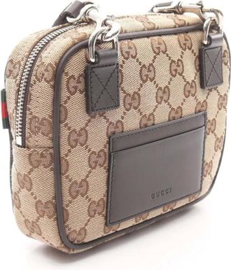 Gucci 2016-2025 Mini GG Canvas Web crossbody bag - Brown