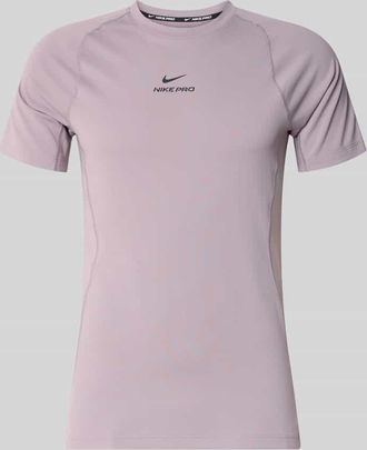 Nike T-Shirt mit Logo-Print und Raglan&auml;rmeln in Lila, Gr&ouml;&szlig;e XXL