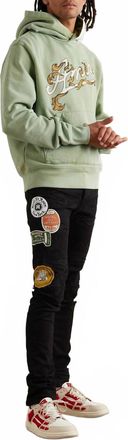 Amiri Travel Patch Repair Jeans In Black