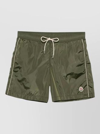 Moncler swim shorts side stripes back pocket