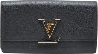 Louis Vuitton Pre-owned Wallets, female, Black, Size: ONE SIZE Pre-owned Portefeuille Capucines Taurillon Leather Long Wallet