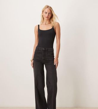 Asos Tall ASOS DESIGN Tall - Jeans a vita alta con fondo ampio neri con tasche sul davanti-Nero