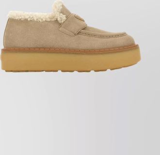 Prada suede loafers featuring platform sole