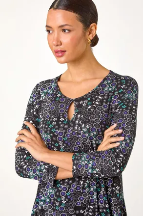 Roman Abstract Circle Print Cutout Tunic Top