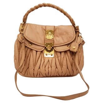 Miu Miu Matelasse Coffer Hobo Bag in Beige Leather