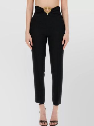 Moschino slim-fit trousers with heart appliqu&eacute;