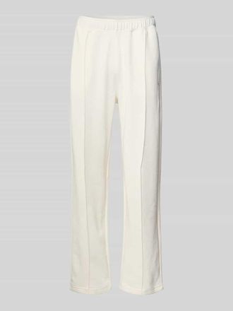 Champion Sweatpants mit L&auml;ngsn&auml;hten und Label-Stitching in Offwhite, Gr&ouml;&szlig;e XXL