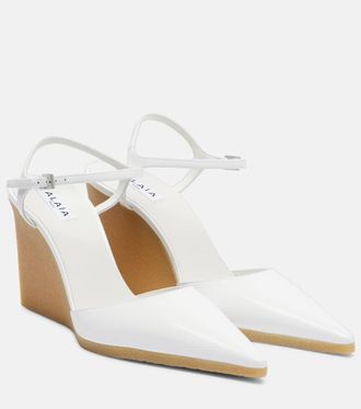 Alaia 90 patent leather wedge slingback pumps