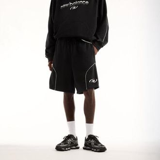 New Balance Uomo Trackside French Terry Short 7 in Nero, Maglia di Poliestere, Taglia M