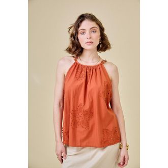 See U Soon Top met parels op de bandjes