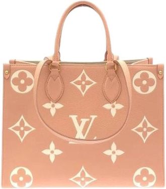 Louis Vuitton Pre-owned On The Go Monogram Empreinte Tas - Dames - Vintage Shopper - Beige - ONE Size - Leer - Vintage
