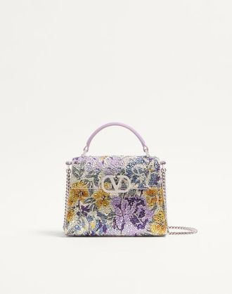 Valentino Garavani Valentino Garavani mini Vsling handbag with Flowerism rhinestone motif and jewel logo Wo