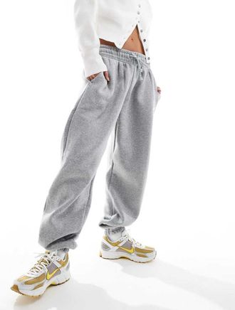 Nike Phoenix Fleece - Joggers oversize a vita alta grigi con polsino-Grigio