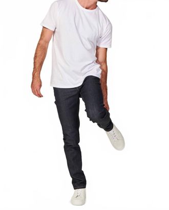 Rustic Dime Slim Taper Denim Jeans In Raw