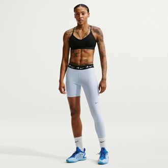 Nike Womens Aja Wilson Asymmetric Reversible Single-Leg Basketball Leggings in Blue | II4223-407
