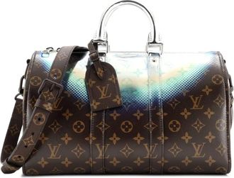 Louis Vuitton Keepall Bandouliere Bag Limited Edition metallic Nebula Monogram canvas 35 tas - Bruin